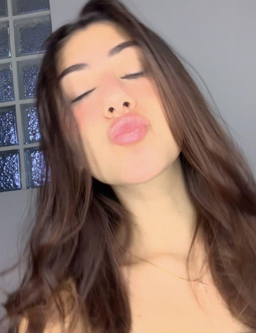 A girl on camera, ready for a private call